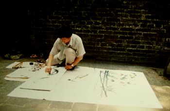 Cestni slikar na tleh slika tradicionalne kitajske slike